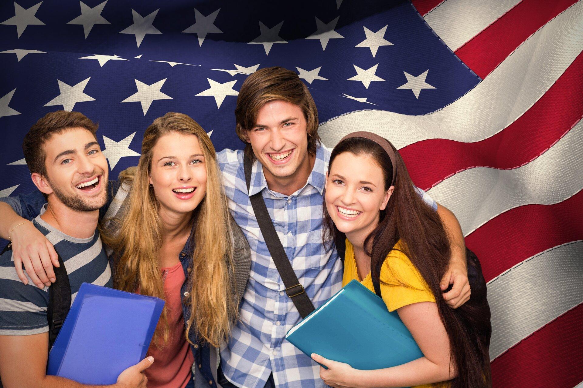 Composite image of students holding folders at college corridor